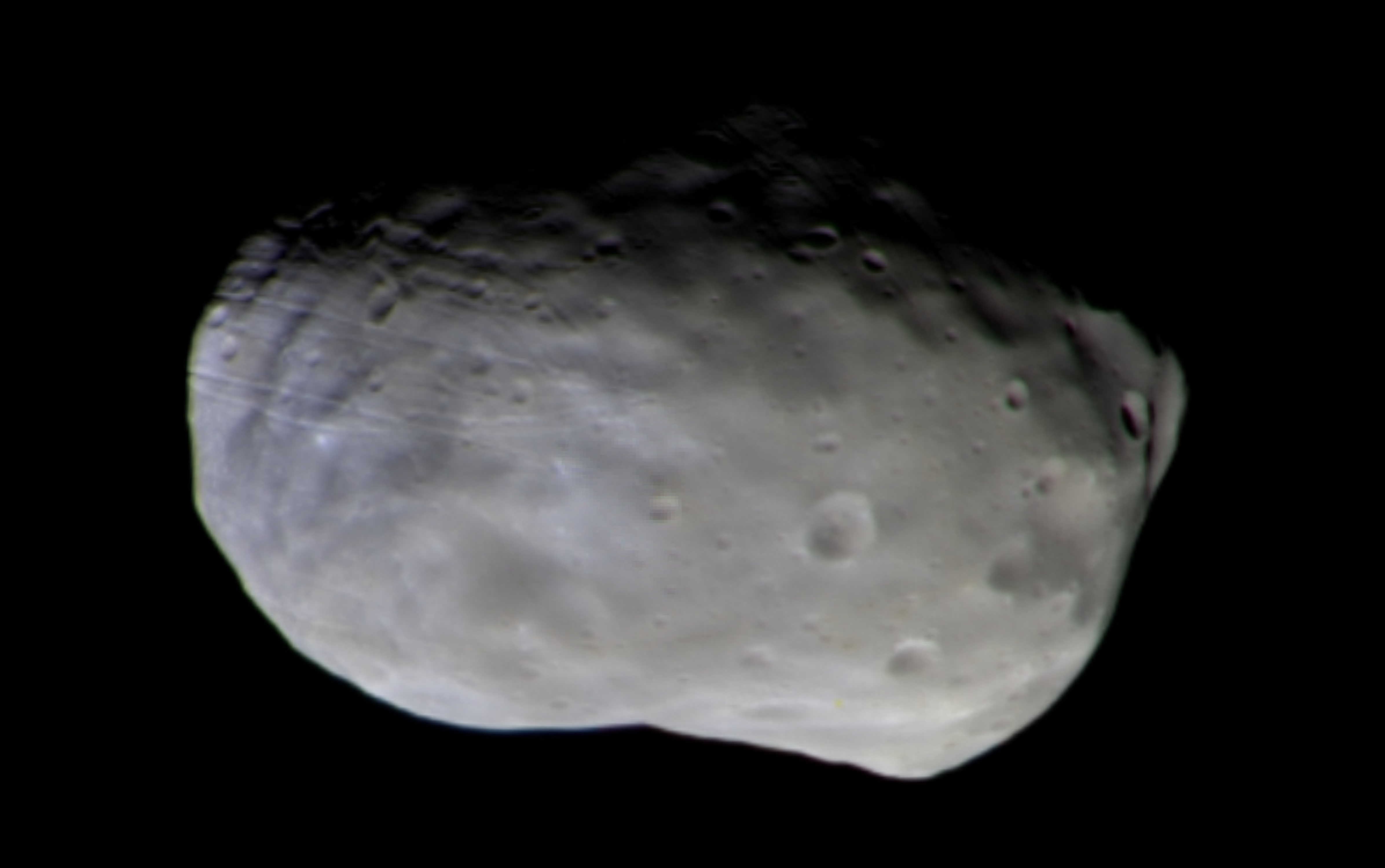 Foto a colori dello strumento CaSSIS a bordo del TGO della luna di Marte Phobos.